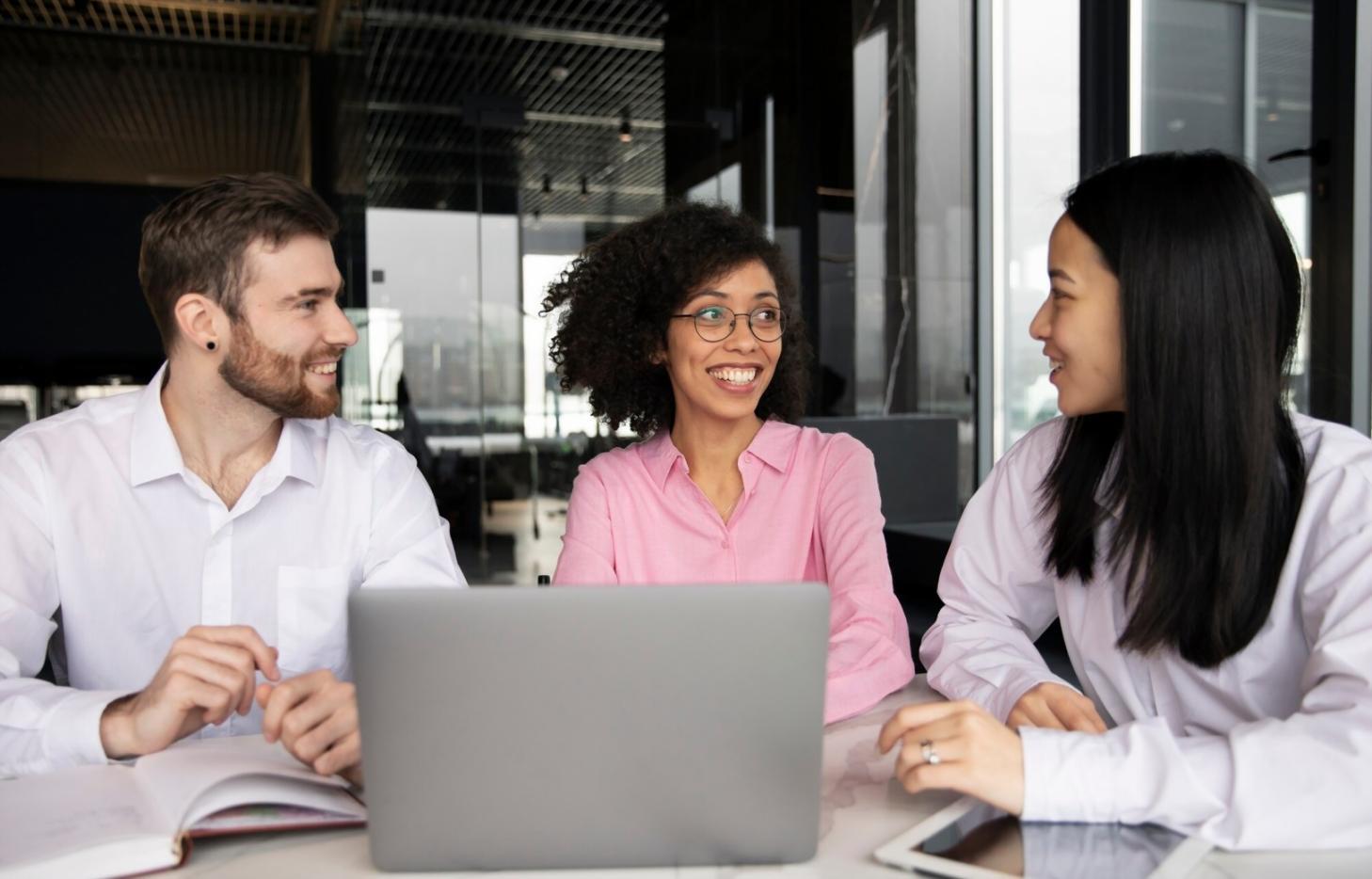 Professional leadership coaching session showing confident business leaders
